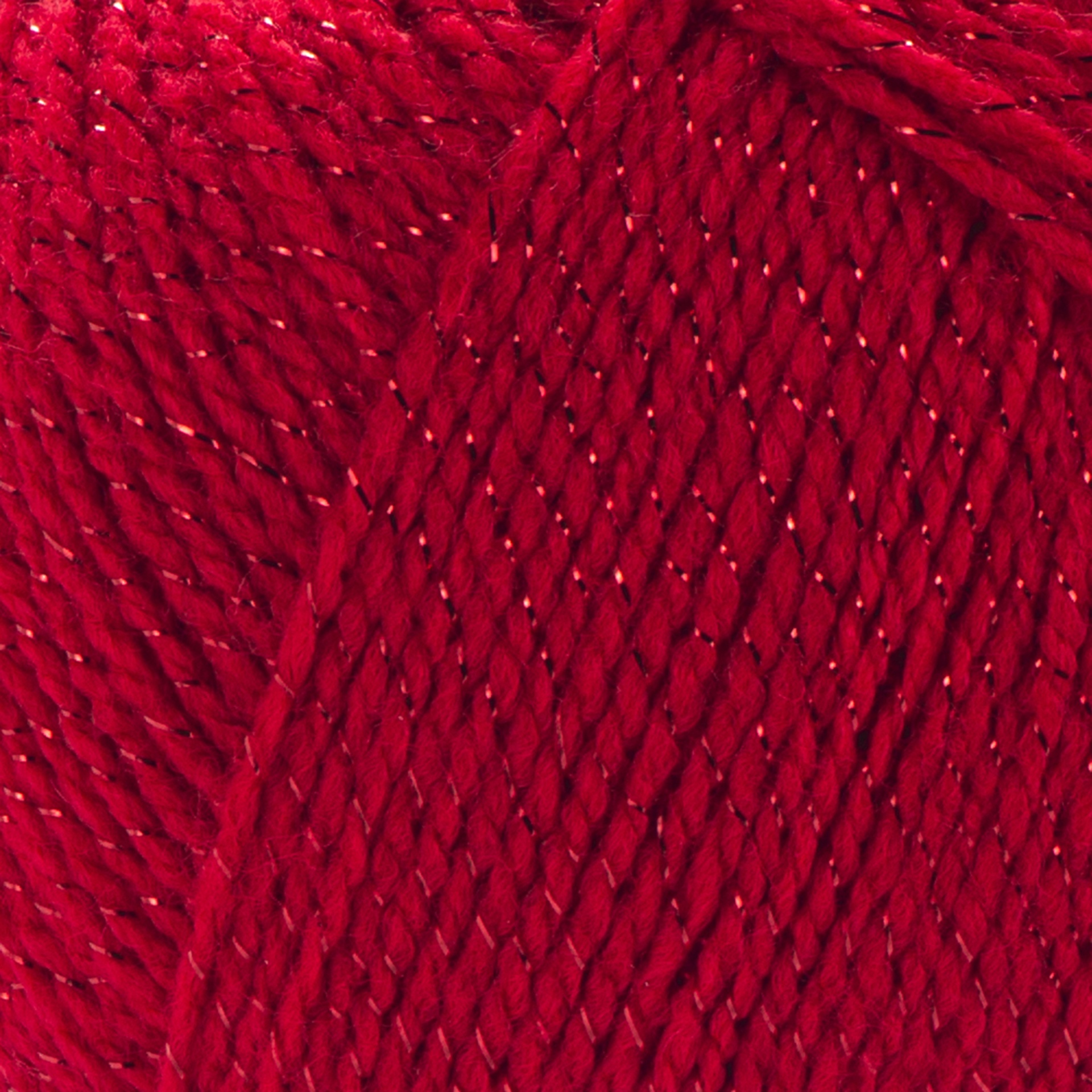 Novelo de fio de lã vermelho com fio metálico prateado entrelaçado