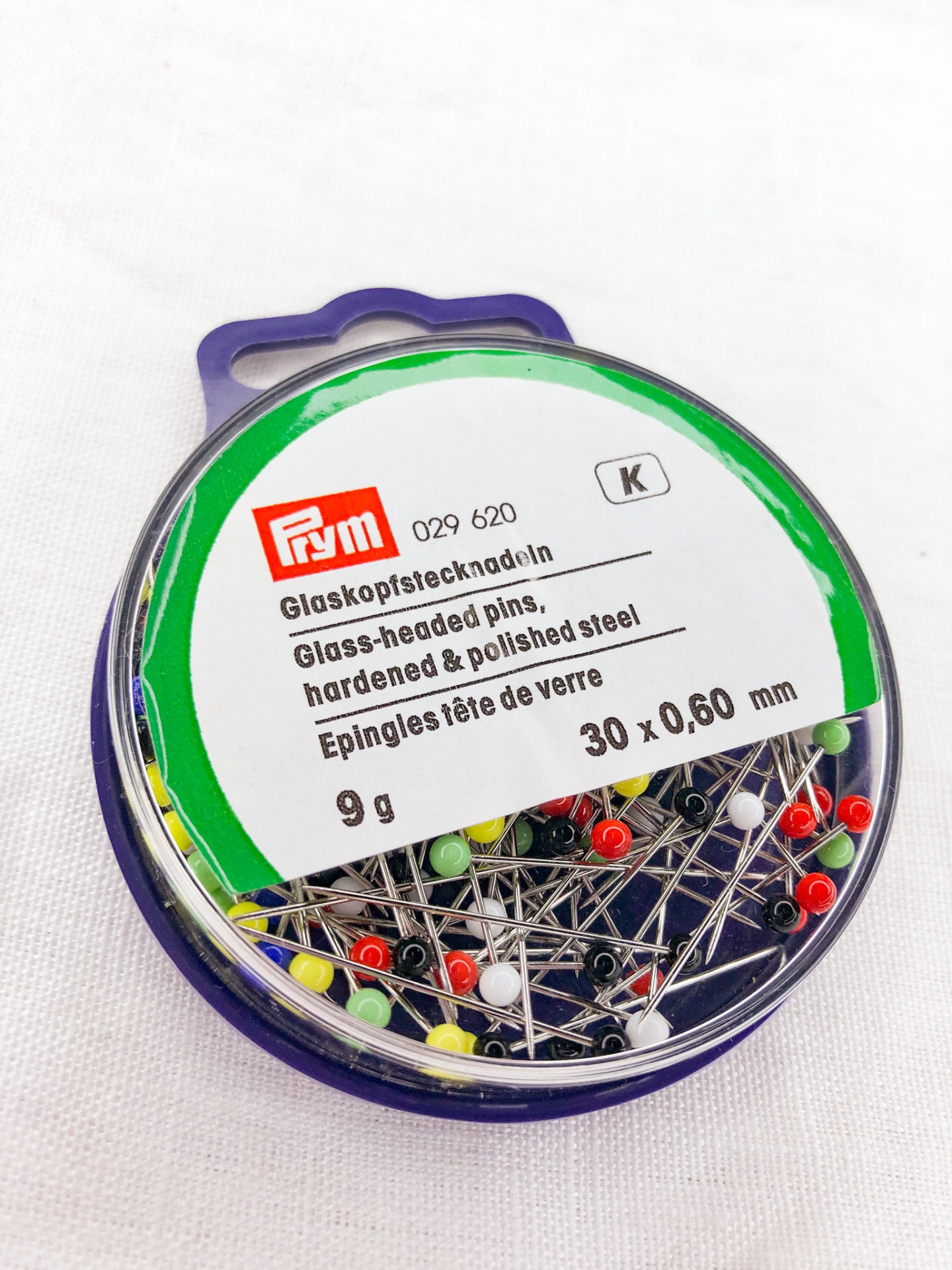 Embalagem de alfinetes de cabeça de vidro coloridas Prym com tampa roxa