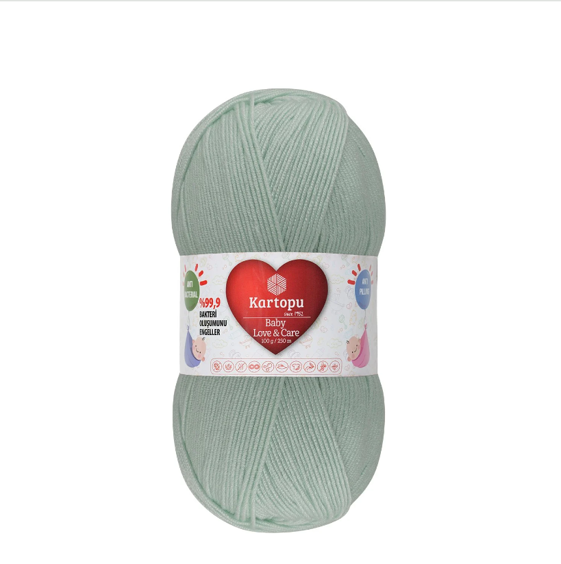 Novelo de lã verde claro com etiqueta Kartopu Baby Love & Care