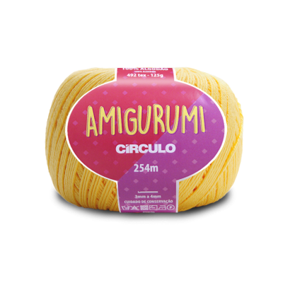 Novelo de fio de algodão amarelo com etiqueta roxa e rosa