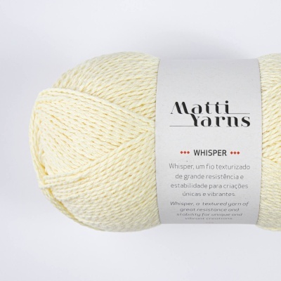 Novelo de fio texturizado amarelo claro com etiqueta branca da Matti Yarns