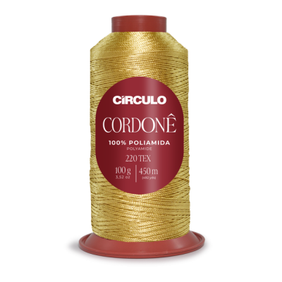 Rolo de linha dourada com rótulo vermelho e branco