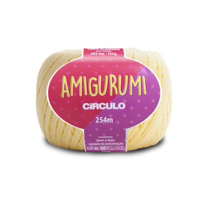 Fio Amigurumi amarelo da marca Círculo com etiqueta rosa e roxa.