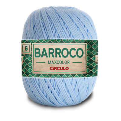 Novelo de linha azul clara com etiqueta verde escura e escrita BARROCO MAXCOLOR CÍRCULO