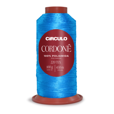 Carretel de linha azul da marca Círculo com etiqueta vermelha e texto branco