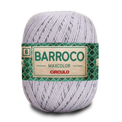 Novelo de fio cinza claro com rótulo verde e bege com texto