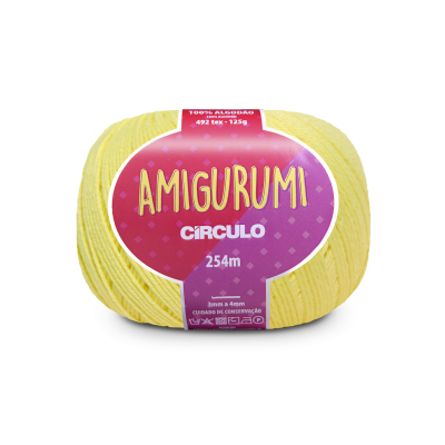 Novelo de lã amarelo claro com etiqueta rosa e roxa AMIGURUMI CÍRCULO