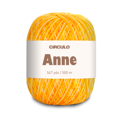 Novelo de fio amarelo e laranja com rótulo branco e texto CIRCULO Anne