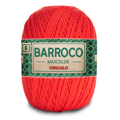 Novelo de fio vermelho com rótulo verde e texto impresso