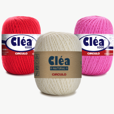 Três novelos de linha Cléa de algodão, cores vermelha, natural e rosa
