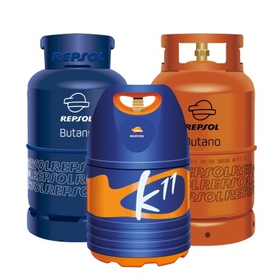 Três botijas azuis e laranja de gás butano da REPSOL