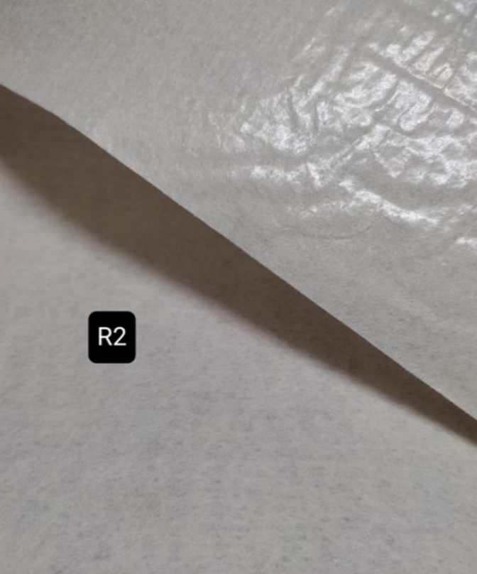 Manta Termocolante R2 200g Premium Material branco texturizado com etiqueta preta 'R2'