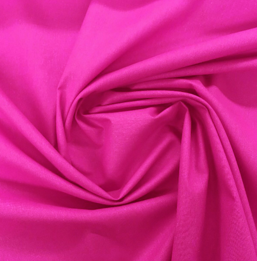Tecido Fucsia Tecido rosa fúcsia liso em dobras espiral