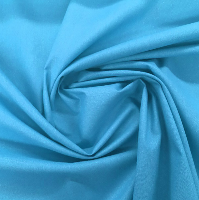 Tecido Turquesa Tecido azul celeste liso com dobras