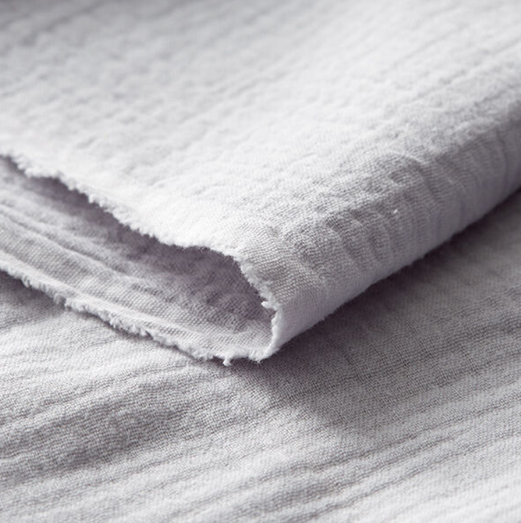 Musseline cinza Tecido branco texturizado dobrado
