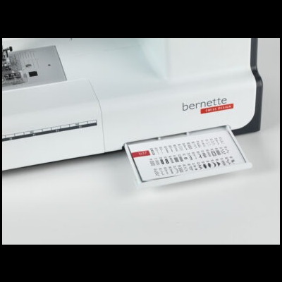 Máquina de costura branca bernette com painel de padrões de costura