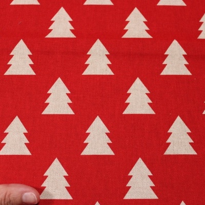 Tecido vermelho com padrão de árvores de Natal brancas