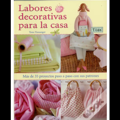 Capa de livro com tecidos e uma boneca Tilda em tons pastel