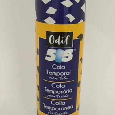 Embalagem cilíndrica de cola temporária para tecido Odif 505 com rótulo amarelo e azul.