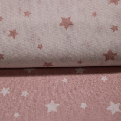 Tecido de algodão rosa com padrão de estrelas