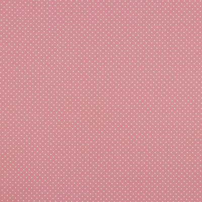 Papel de parede ou tecido cor de rosa com pontos brancos pequenos.