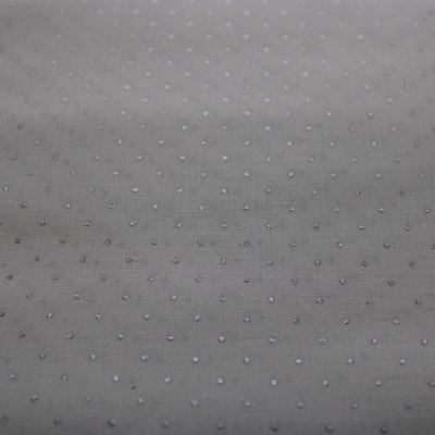 Tecido cinzento com pequenos pontos em relevo