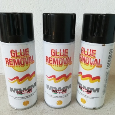 Três latas de spray Glue Removal MW com tampa preta e rótulo branco