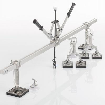 Aparelho de medição metálico com manípulos pretos e base preta