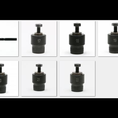 Conjunto de brocas e peças metálicas pretas numeradas de 17 a 22