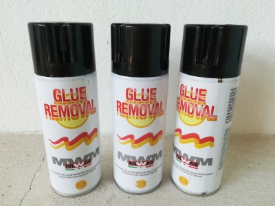 Três latas de spray Glue Removal MW com tampa preta e rótulo branco