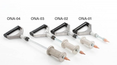 Quatro ferramentas metálicas com cabo e ponta laranja identificadas como ONA-04, ONA-03, ONA-02 e ONA-01