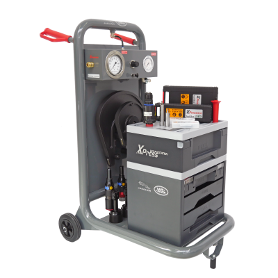 Carrinho cinzento com caixa de ferramentas XPress e manómetros Land Rover