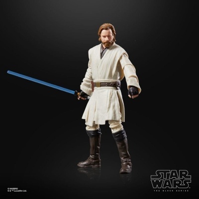 Figura de ação Star Wars com túnica creme e espada de luz azul