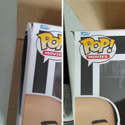 Duas caixas de Funko Pop! Movies com cabeças parcialmente visíveis