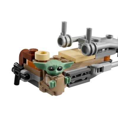 Brinquedo de construção Lego Baby Yoda com estrutura em várias cores e detalhe de nave