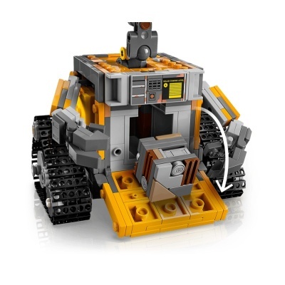 Robô de brinquedo construído com peças tipo LEGO em cinza, preto e amarelo