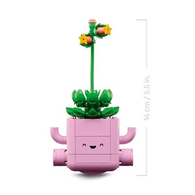 Figura de planta em blocos tipo LEGO com vaso roxo e flores amarelas e rosa