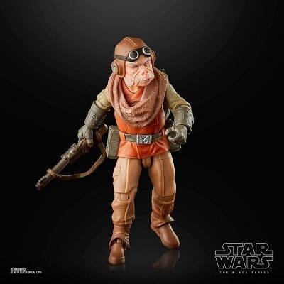 Figura de ação Star Wars de alienígena com jaqueta laranja e bege, lenço castanho, botas castanhas e óculos, segurando arma.