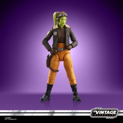 Figura de ação Star Wars com pele verde e roupa laranja e cinzenta