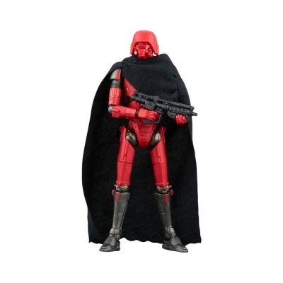 Figura de ação vermelha com capa preta segurando arma