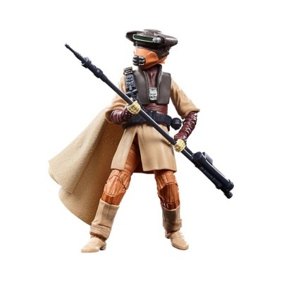 Figura de ação com roupa castanha e beige, capa, capacete e arma preta
