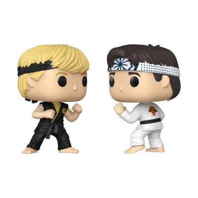 Duas figuras Funko Pop de karaté em kimonos preto e branco frente a frente