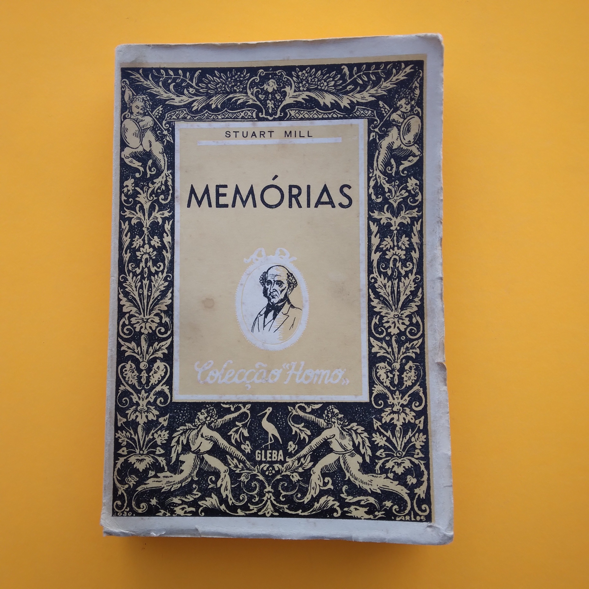 Memórias, Stuart Mill Livro antigo 'MEMÓRIAS' de Stuart Mill com capa decorativa e retrato em fundo laranja