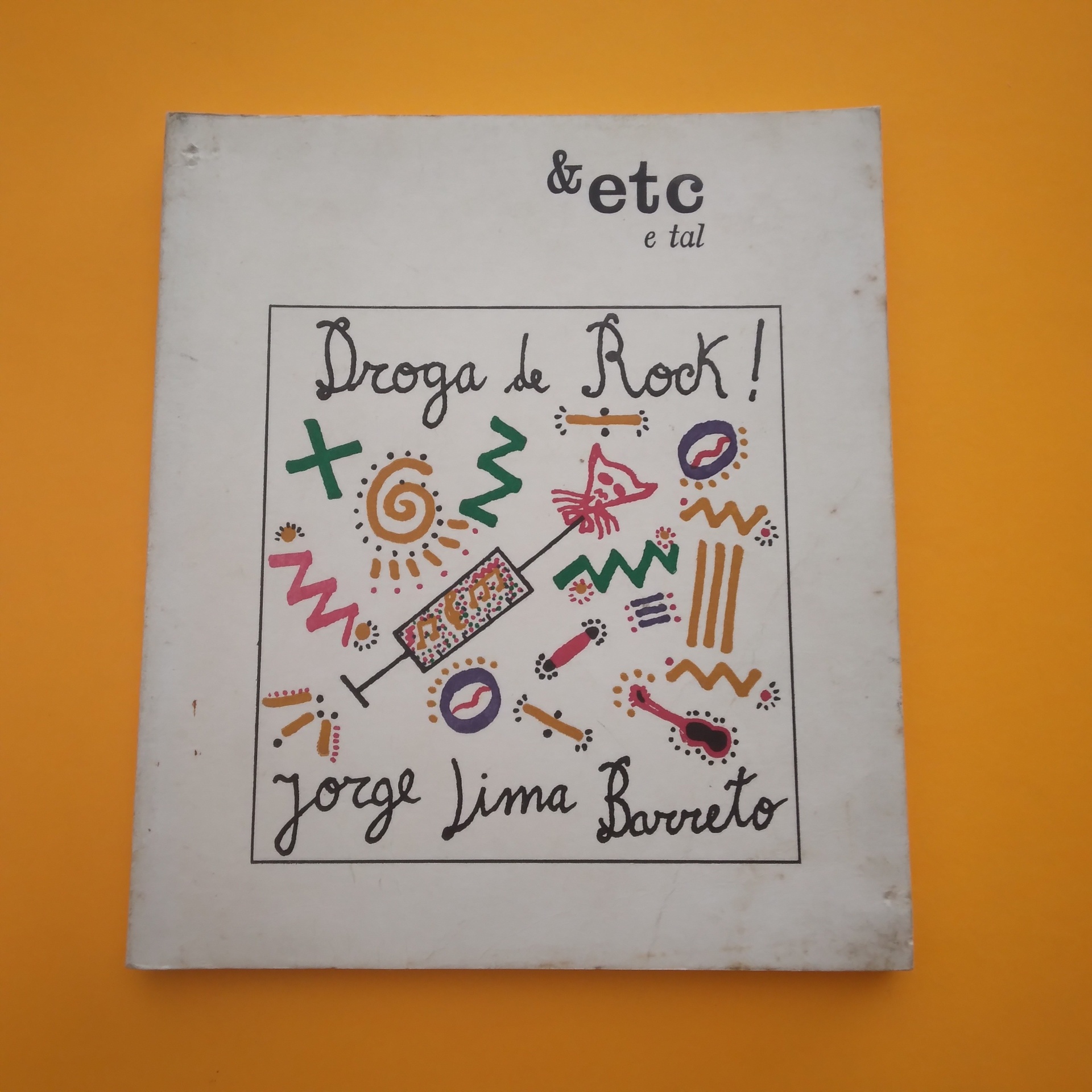 Droga de Rock, Jorge Lima Barreto Capa de disco de vinil com ilustrações coloridas e texto Droga de Rock!