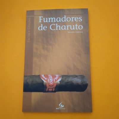 Livro 'Fumadores de Charuto' com capa castanha e charuto na ilustração