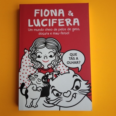 Capa do livro Fiona & Lucifera com ilustração de rapariga e dois gatos