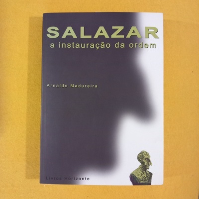 Capa do livro SALAZAR a instauração da ordem com fundo lilás e branco e busto verde