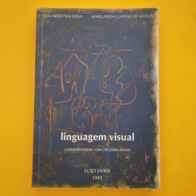 Livro 'linguagem visual' com capa azul escura, desenhos abstratos e texto branco