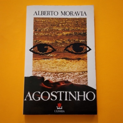 Capa do livro 'AGOSTINHO' de Alberto Moravia com imagem estilizada e texto em preto e branco.