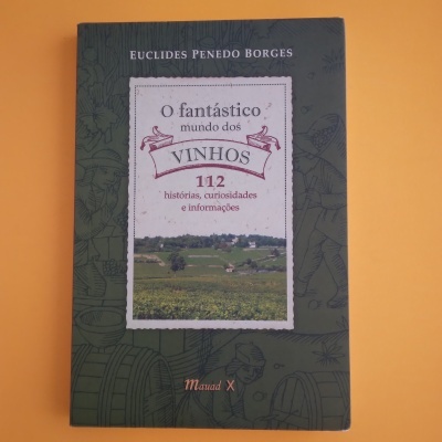 Capa de livro sobre vinhos com texto e ilustrações em fundo verde e branco